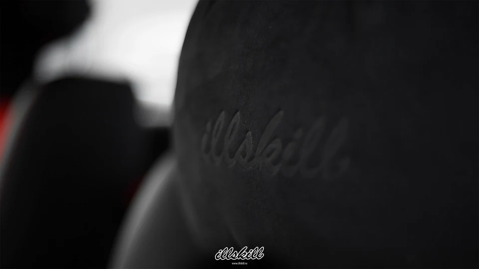 Подушка с вышивкой ILLSKILL на подголовнике